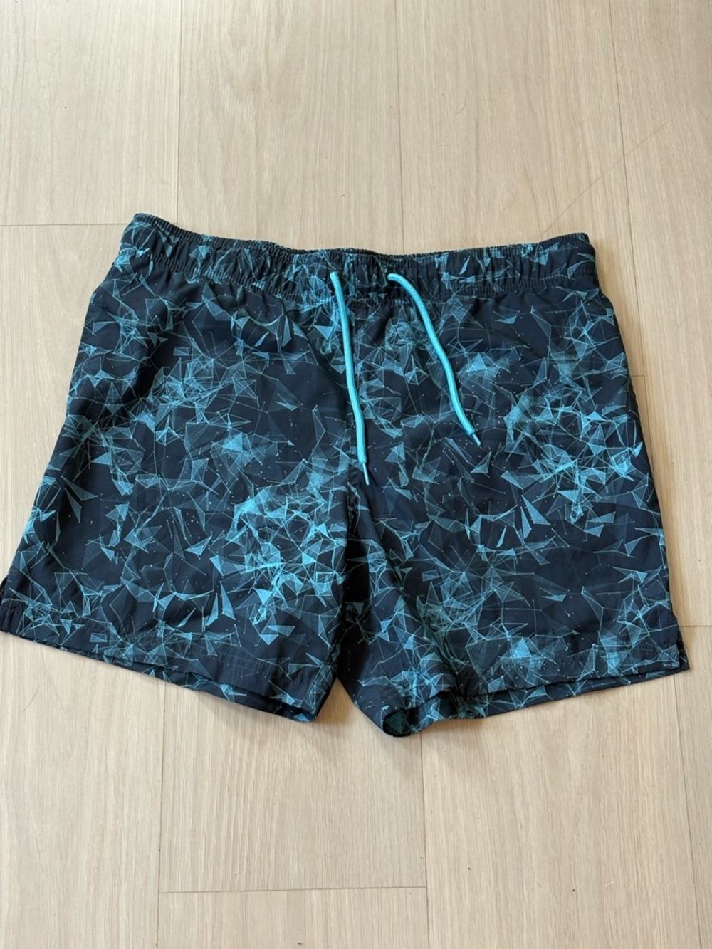 Black Swim Trunks with Teal Geometric Print